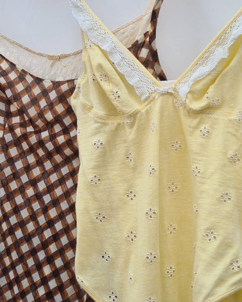 Two vintage italian bodysuits yellow and brown with lace details