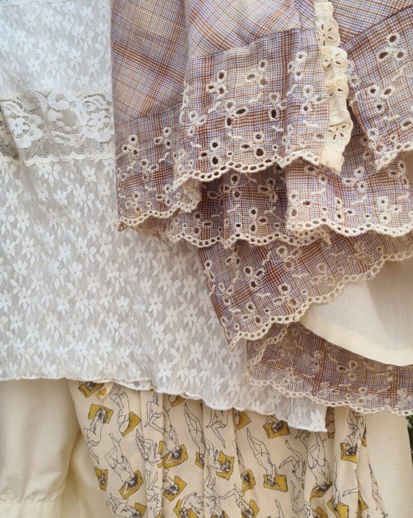 different types of vintage clothing details like lace and silk texture